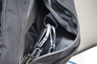 Keys and case attached to key loop in bag