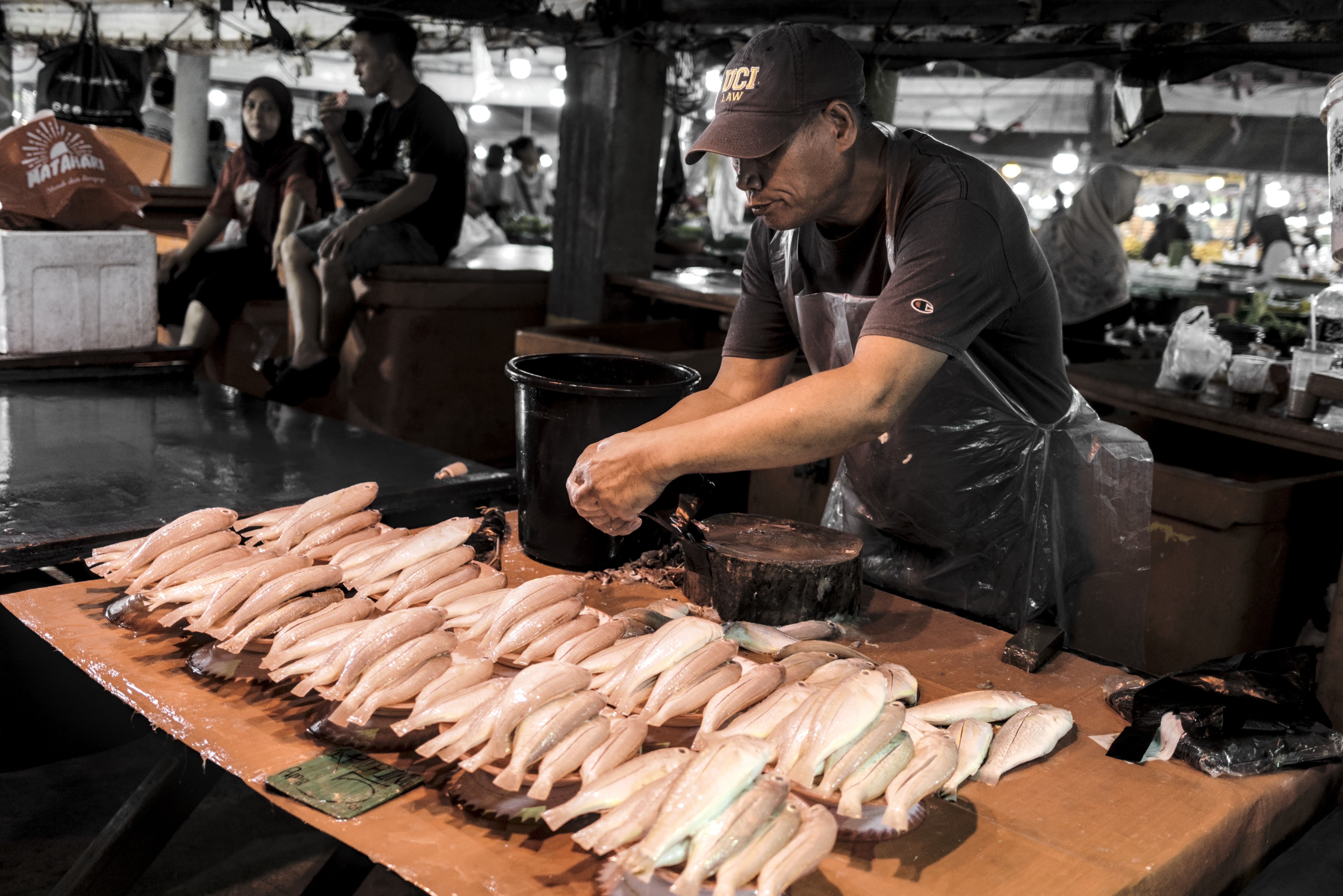 Fishmonger at Kota Kinabalu Wet Market